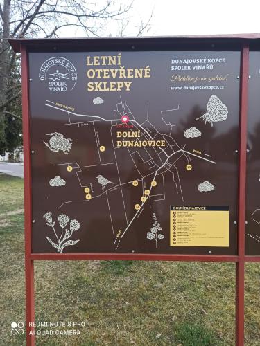 a sign for the leith observatory strategy in a park at Familly Apartmens in Dolní Dunajovice