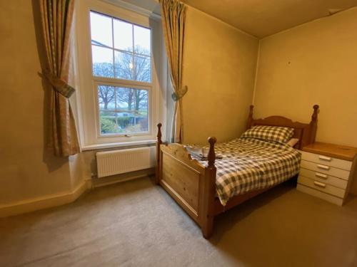 En eller flere senge i et værelse på lake District cottage