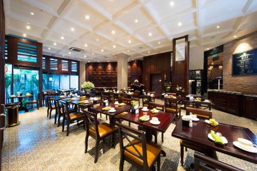 En restaurant eller et andet spisested på Alagon Saigon Hotel & Spa