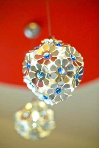 a close up of a ring hanging from a ceiling at Love's World B&B in Jian