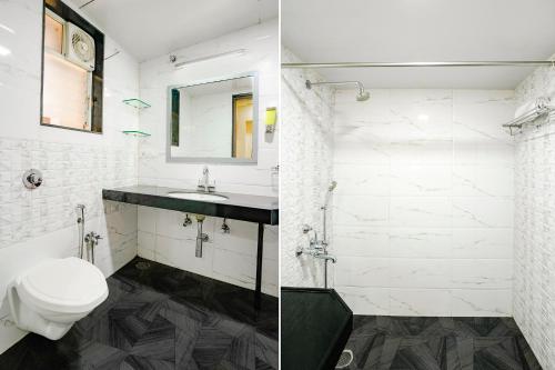 a bathroom with a toilet and a sink at FabHotel Happy Homely Stay - Airport road in Pune