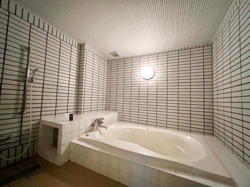 Un baño de SKY Bali Style Beppu, Resort Love Hotel
