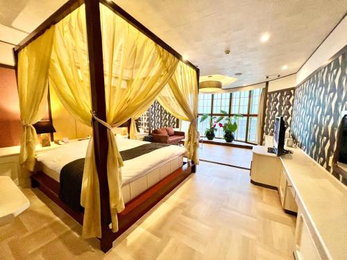 Cama o camas de una habitación en SKY Bali Style Beppu, Resort Love Hotel