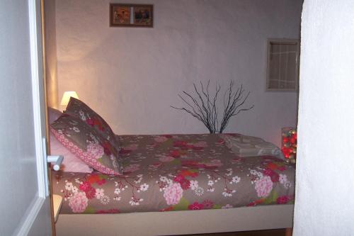Postel nebo postele na pokoji v ubytování Salomony Chambre d'Hôtes