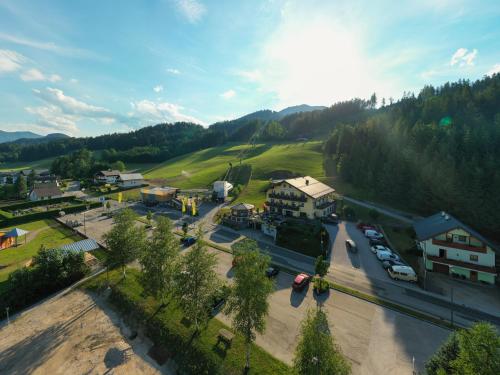 an aerial view of a small town in the mountains at Gasthof zum Sessellift in Mitterbach