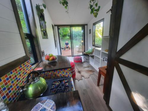 Posezení v ubytování Tiny Home Trails End