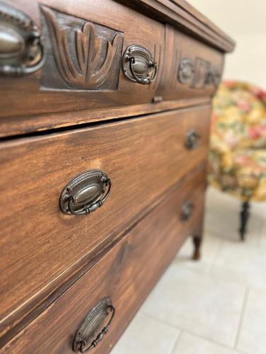 a wooden dresser with a wooden drawer at Alte Druckerei in Quedlinburg