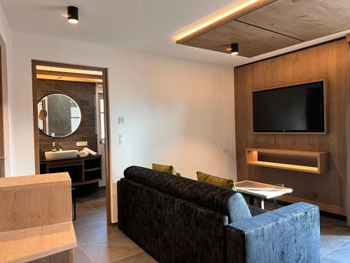 Μια τηλεόραση ή/και κέντρο ψυχαγωγίας στο Adlhof Apartments
