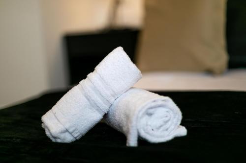 a roll of toilet paper sitting on a table at Re di Roma Rooftop in Rome