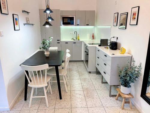 Kuchyňa alebo kuchynka v ubytovaní Venus Apartments - King Street IV