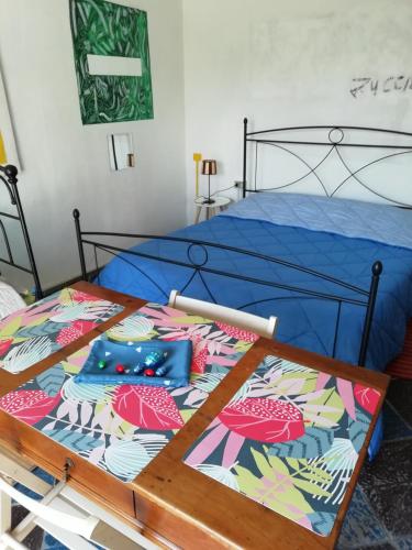 Postel nebo postele na pokoji v ubytování B&B Porte Rosse