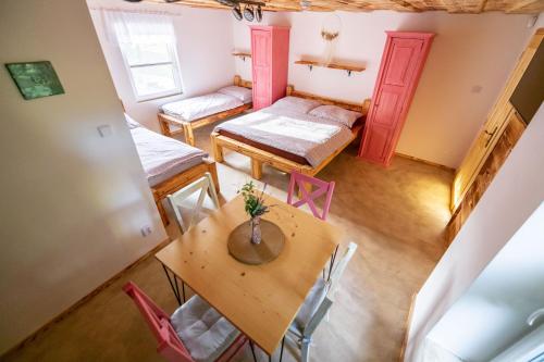 an overhead view of a room with a table and chairs at Penzion - Vinařství Hanuš in Blučina