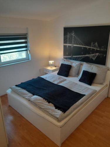 Ένα ή περισσότερα κρεβάτια σε δωμάτιο στο Caliente Apartments Vir A
