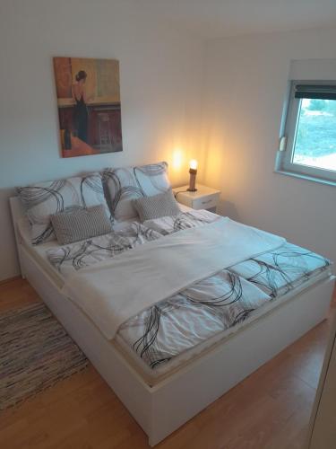 Ένα ή περισσότερα κρεβάτια σε δωμάτιο στο Caliente Apartments Vir B