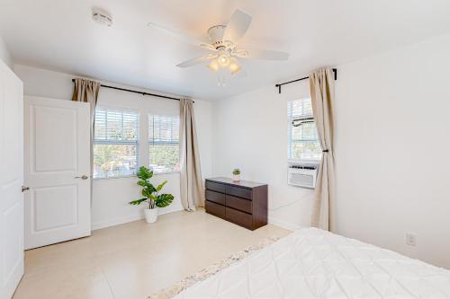 Ένα ή περισσότερα κρεβάτια σε δωμάτιο στο Tropical Hideway