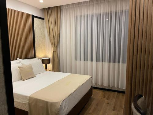 Voodi või voodid majutusasutuse Deluxe Resort and SPA toas