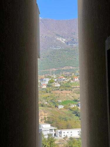 a view of a city from a window of a building at Panorama Apartments in Tirana
