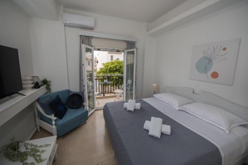 a bedroom with a bed with crosses on it at 4k GEM in Ierapetra