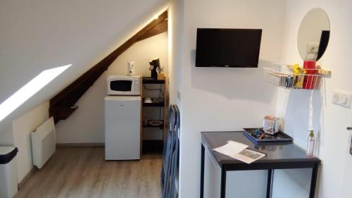 Kuchyňa alebo kuchynka v ubytovaní Le Relais de Louis