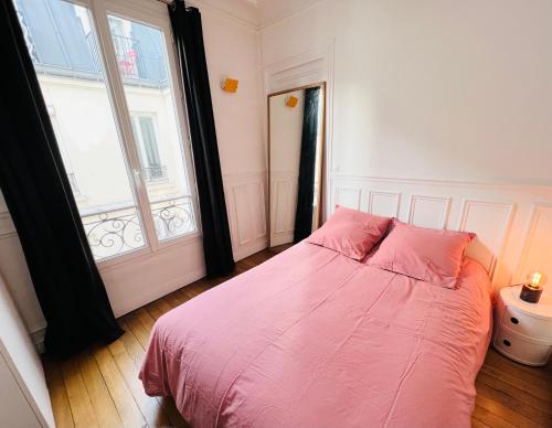 Fotografia z galérie ubytovania Charmant appartement entre Montmartre et canal Saint Martin-gare du nord v Paríži
