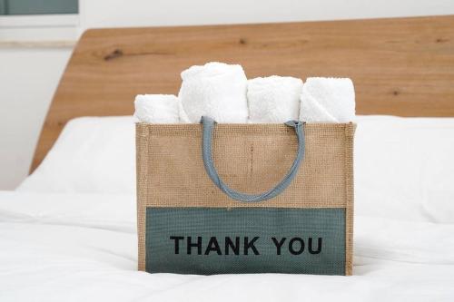 a bag of toilet paper with the words thank you at Luxurious Apartment Next to the Sea in Il-Gżira