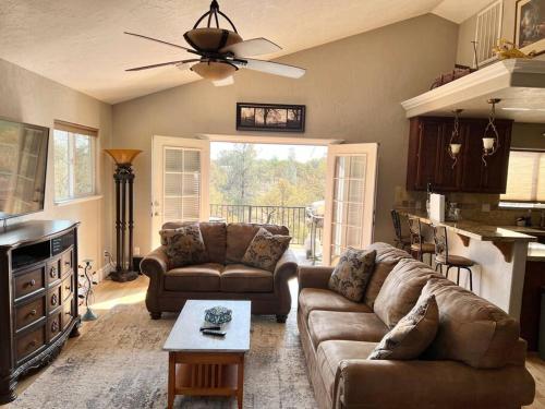 a living room with a couch and a table at Beautiful and Relaxing Guest House!! in Redding