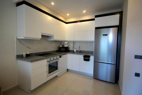 Ett kök eller pentry på Konak Terrace - 50m to sea - Luxury&Location