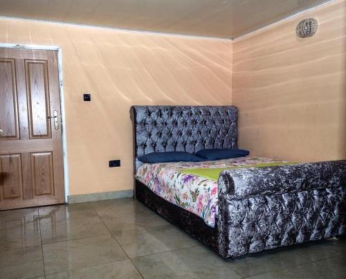 Postel nebo postele na pokoji v ubytování M & B Residence