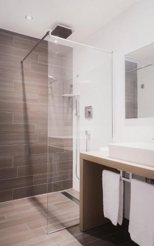 Ein Badezimmer in der Unterkunft Hotel Bartaccia