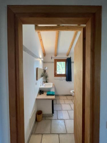 a bathroom with a sink and a mirror at Sa Rezzetta in Golfo Aranci