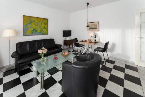 Televisyen dan/atau pusat hiburan di Huize Mare Appartementen
