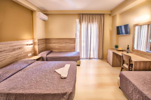 Postel nebo postele na pokoji v ubytování Sofia Hotel