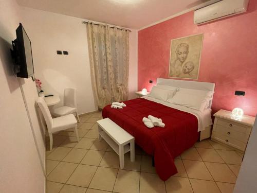 A bed or beds in a room at Il Casale Della Fornace