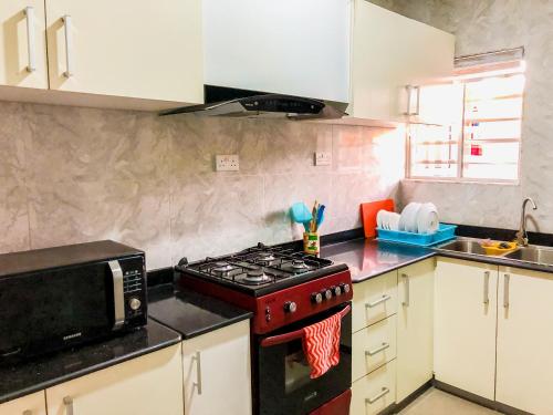 Kuchyň nebo kuchyňský kout v ubytování Crayford Homes