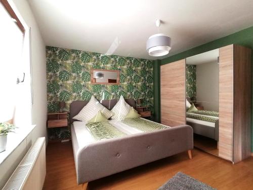 a living room with a couch in a room at Melanies Wohlfühlort in Bruttig-Fankel