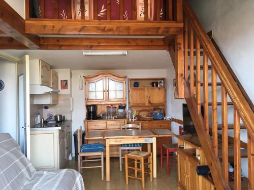 Kuchyň nebo kuchyňský kout v ubytování Maisonnette bord de plage