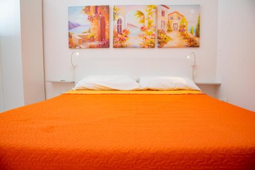 A bed or beds in a room at Casa Vacanze Nike