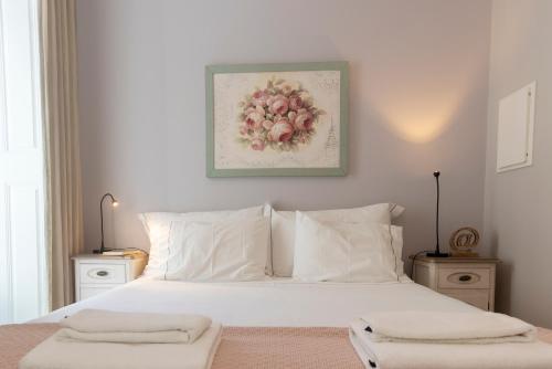 Ένα ή περισσότερα κρεβάτια σε δωμάτιο στο TikLiving