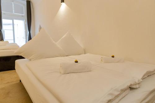 Letto o letti in una camera di Servus Apartments Old Town Premium