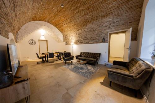 Area soggiorno di Servus Apartments Old Town Premium