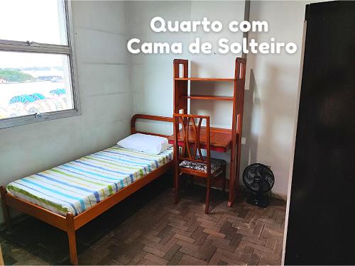 Katil atau katil-katil dalam bilik di Apartamento em Vitória capital do ES