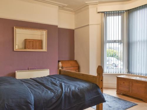 Un pat sau paturi într-o cameră la Sunnyside Hestbank