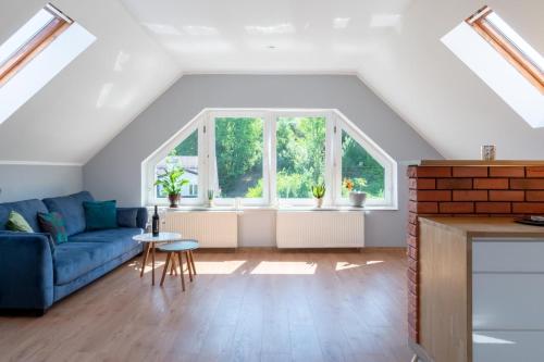 Posezení v ubytování Familia Apartament na wzgórzu 3 z sauną i salą zabaw dla dzieci