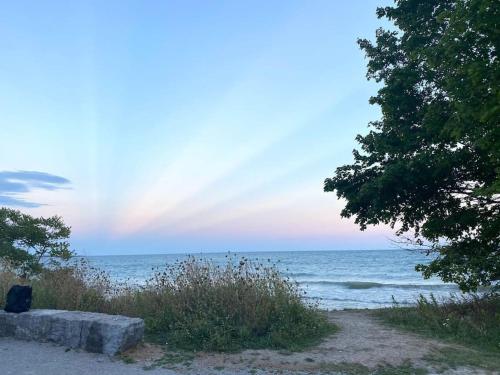 a path to the beach with a view of the ocean at Dazzling Modern Home Next to Beach & Go in Pickering