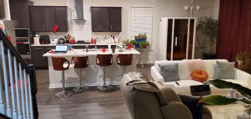 a living room with a couch and a kitchen at 528 Carroll Walk Avenue in Frederick