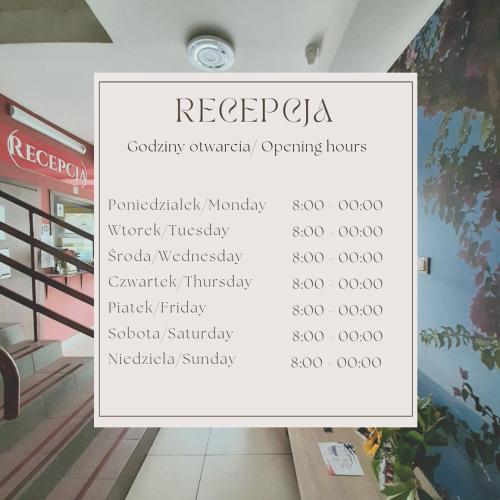 a sign on the wall of a restaurant with a menu at HOTEL RADOMSKO in Radomsko