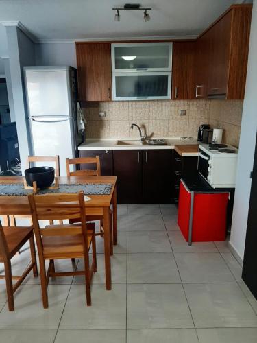 Η κουζίνα ή μικρή κουζίνα στο Όμορφο διαμέρισμα- σοφίτα με υπέροχη θεα