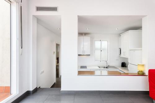 A kitchen or kitchenette at Sant Pau Terraces Apartments