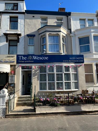 a building with a sign that reads the westrobe at The Wescoe Guesthouse in Blackpool