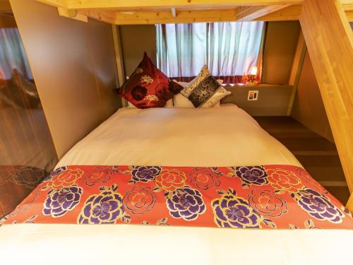 Cama o camas de una habitación en Hale Kyoto Tambaguchi Umekoji Park North
